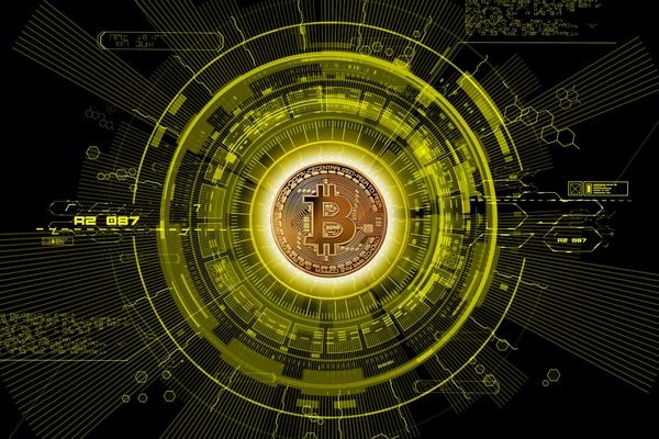 Bitcoin coin in the center of a glowing yellow circuit ring