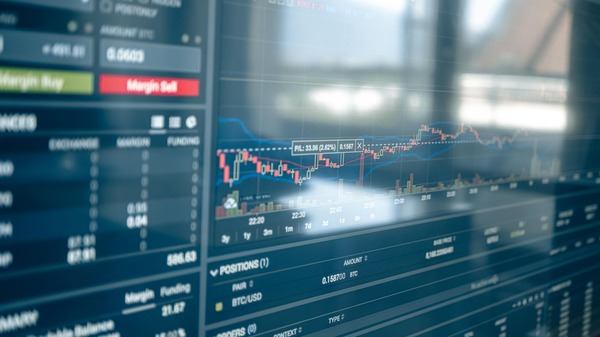 Trading terminal screen with crypto order book and price chart