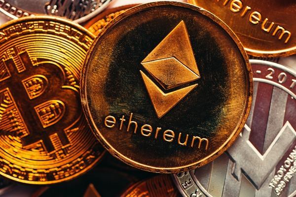 Golden Ethereum coin among Bitcoin coins